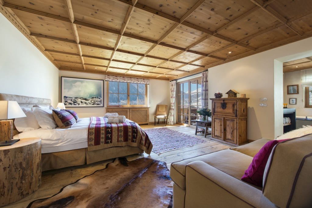Austria's Best Ski Chalet nominee Maria Schnee in World Ski Awards. Here the master bedroom.